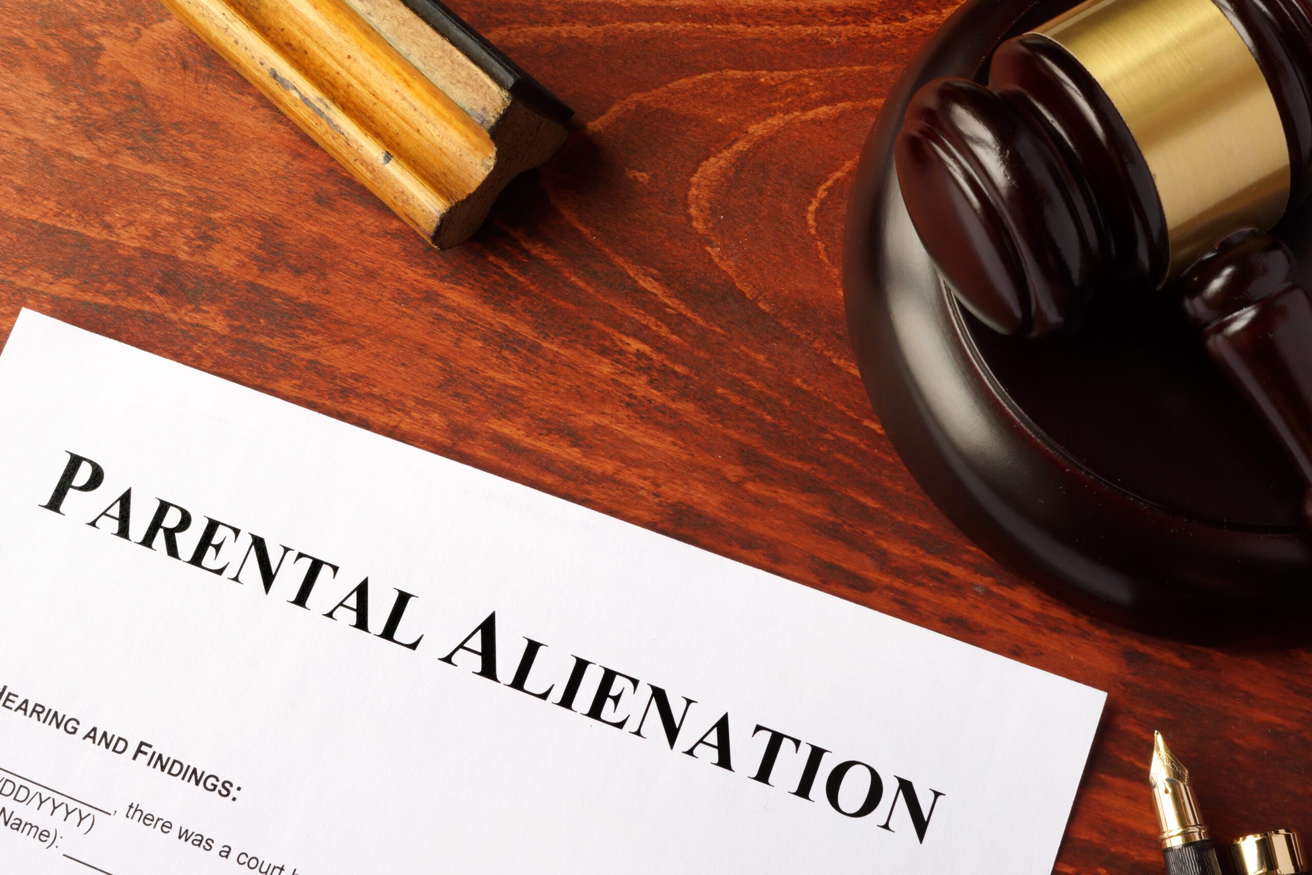 Parental alienation form and gavel on a table. Parental Alienation