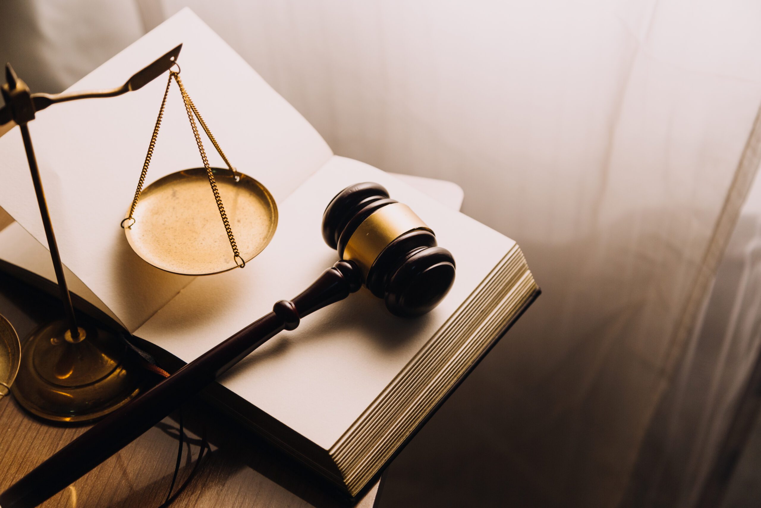 Justice and law concept.Male judge in a courtroom with the gavel Court Settlement